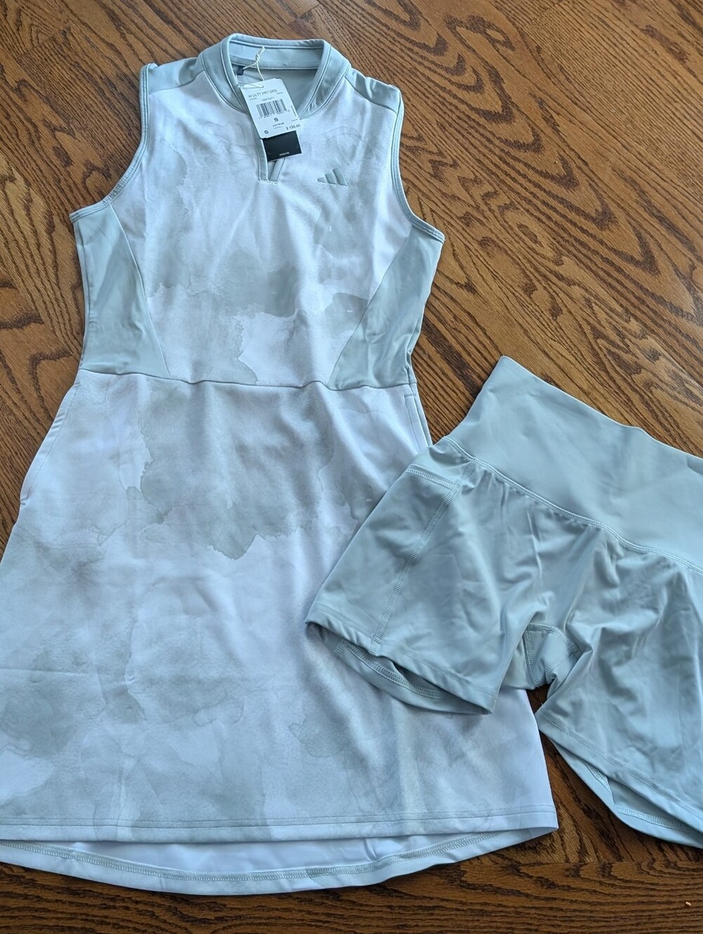 adidas light gray and white sleeveless athletic dress with matching shorts